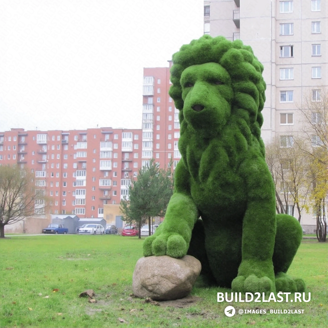 Изображение топиарной фигуры в ландшафтном дизайне сада